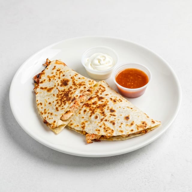 Chicken a la Mexicana Mega Quesadilla – Big, Bold & Bursting with Flavor.